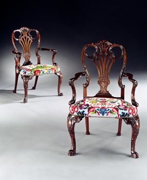 A RARE PAIR OF GEORGE III CARVED MAHOGANY ARMCHAIRS