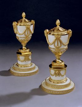 A MAGNIFICENT PAIR OF GEORGE III ‘LYRE ESSENCE' VASES BY MATTHEW BOULTON