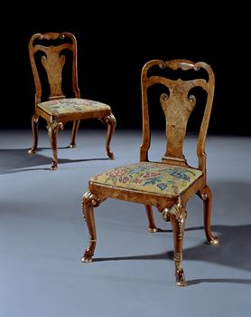 A PAIR OF GEORGE I PARCEL GILT AND BURR WALNUT SIDE CHAIRS