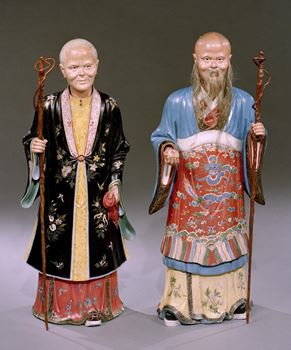A PAIR OF QIANLONG PERIOD CHINESE EXPORT NODDING FIGURES