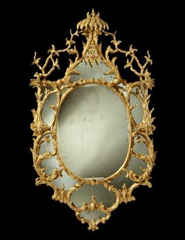 A MAGNIFICENT GEORGE III MIRROR IN THE MANNER OF JOHN LINNELL