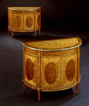 A PAIR OF GEORGE III SATINWOOD COMMODES