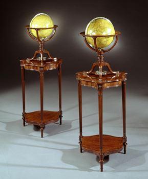 A RARE PAIR OF GEORGE III TABLE GLOBES BY DUDLEY ADAMS ON MAHOGANY STANDS