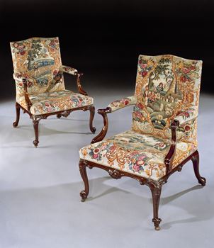 A PAIR OF GEORGE III MAHOGANY NEEDLEWORK LIBRARY ARMCHAIRS 
