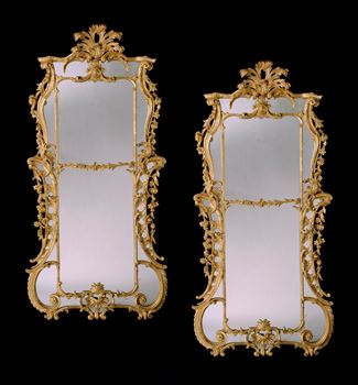 A PAIR OF GEORGE III CARVED GILTWOOD MIRRORS